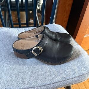 Dansko Black Leather Mules with Gold Buckle